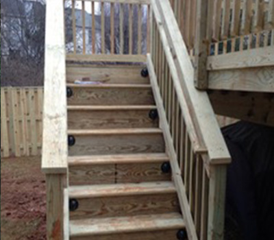 Treated deck steps with lights