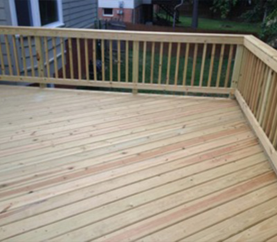 Treated deck with angle boards